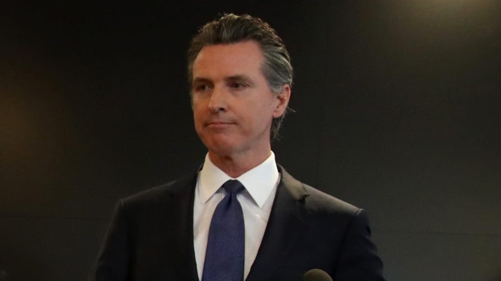 California governor Newsom under fire for attending dinner amid surge