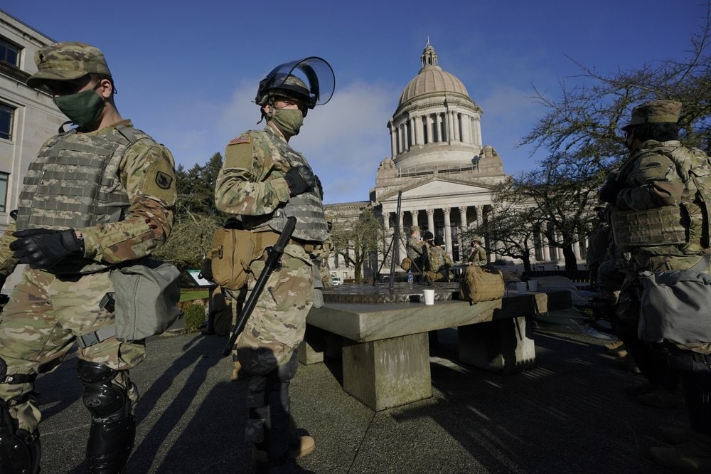 Statehouses, US capital brace for potentially violent week