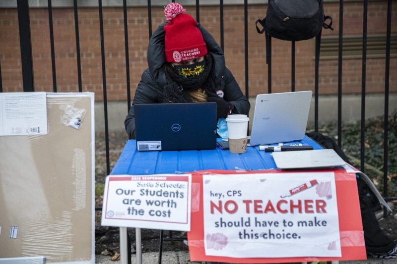 Chicago teachers vote to teach from home, defying district