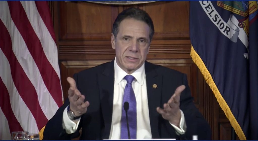 Cuomo defiant as top New York lawmakers call on him to quit