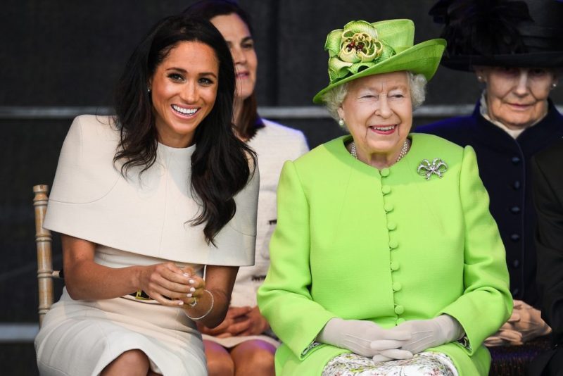 ‘Charlie Hebdo’ cover shows the Queen kneeling on Meghan Markle’s neck