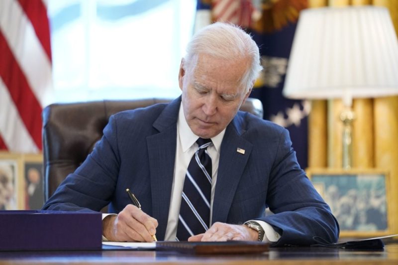 Biden signs $1.9T relief bill before speech to nation