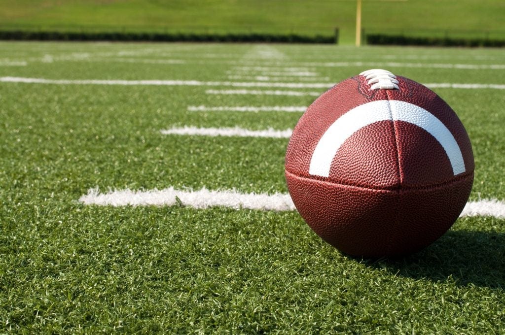 Viral video shows Black high school football player forced to sit in locker with banana peels