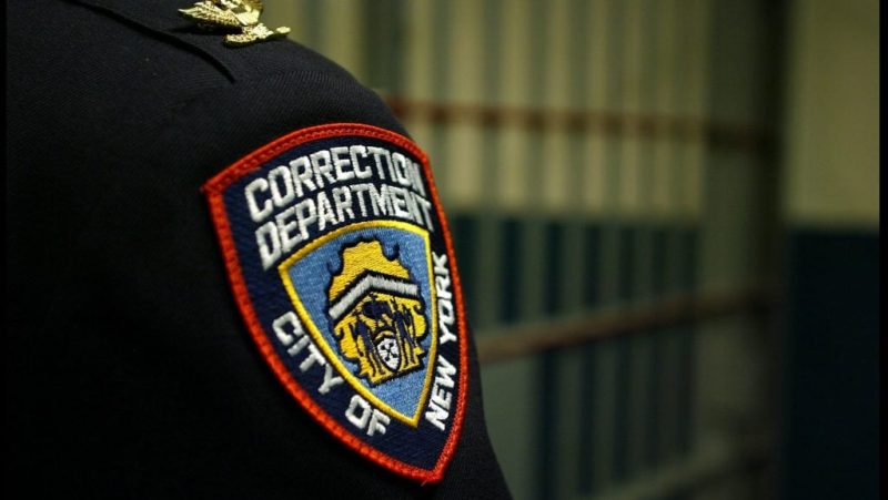 Corrections officer charged after allegedly standing by while inmate killed himself