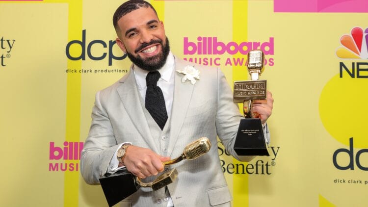 Drake accepts Artist of the Decade at the 2021 BBMAs with his 3-year-old son