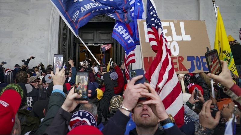 Defense for some Capitol rioters: election misinformation