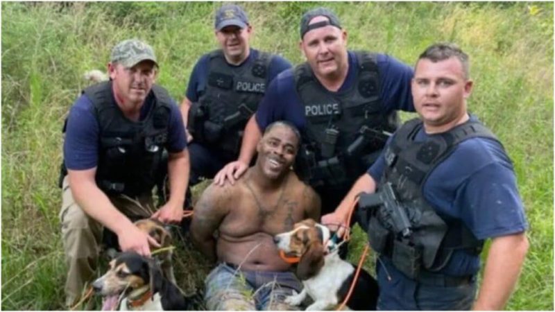 Mississippi police pose with Black man accused of robbing bank