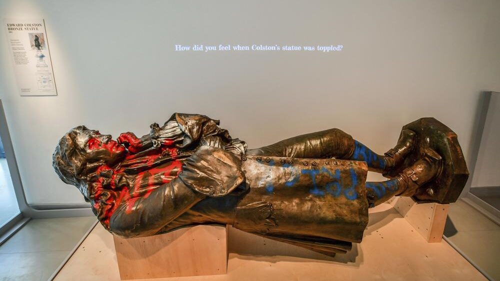 Felled UK slave trader statue displayed; city mulls its fate