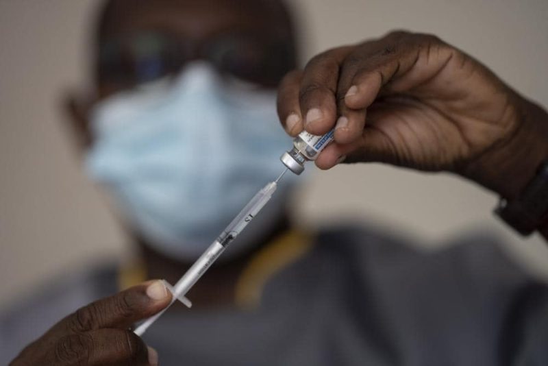 West African health officials race to vaccinate amid spikes