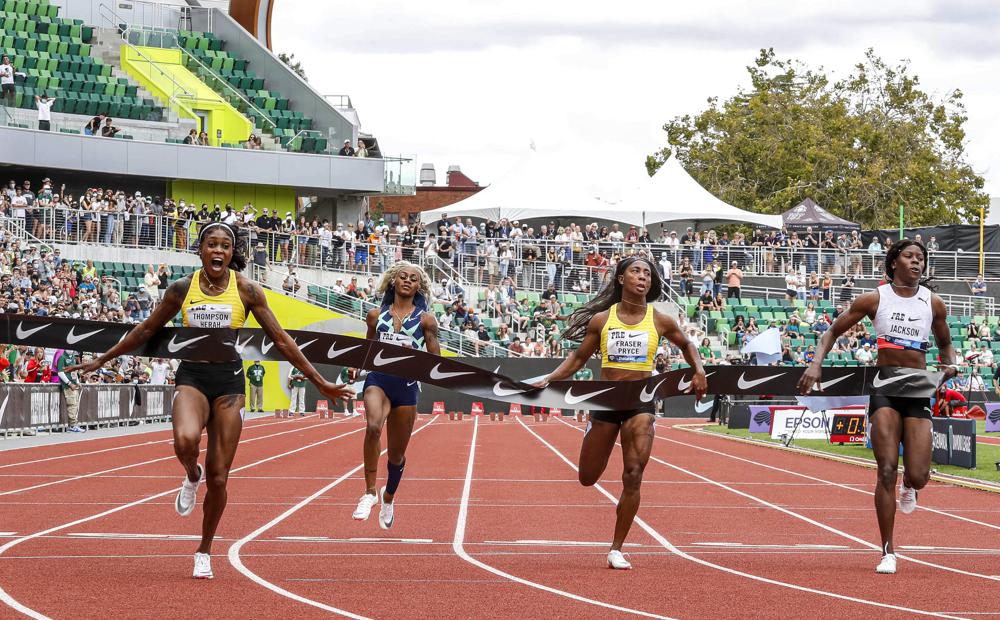 Elaine Thompson-Herah wins 100 meter, falling just short of Flo Jo’s record
