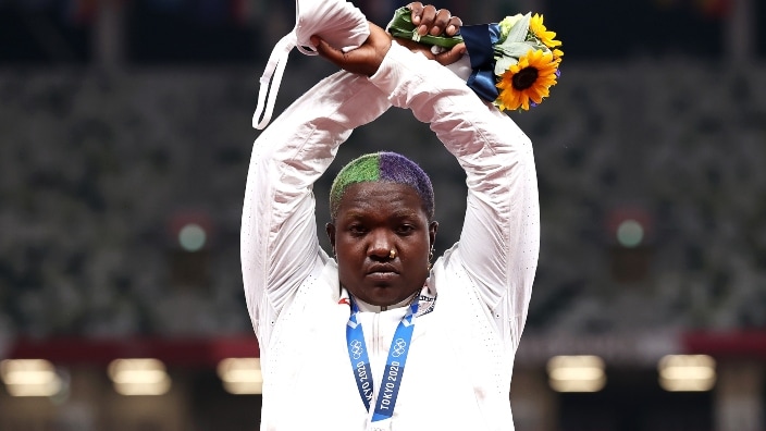 Olympian Raven Saunders protests with ‘X’ gesture on podium