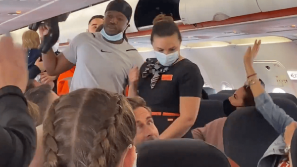 ‘Don’t Get Off, Sit Down’: EasyJet Passengers Revolt Against Crew to Prevent Removal of Two Black Men from UK-to-Spain Flight