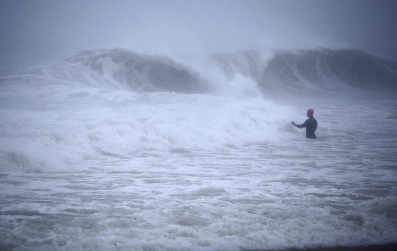 Henri hurls rain as system settles atop swamped Northeast