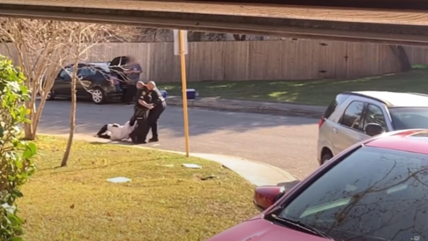 Texas Officer Who Issued Bogus Misdemeanor to Black Man for Not Showing ID Seen Dragging Him Down the Street In New Footage