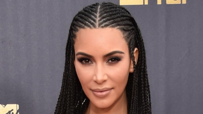 Kim Kardashian addresses blackfishing allegations, wearing braids
