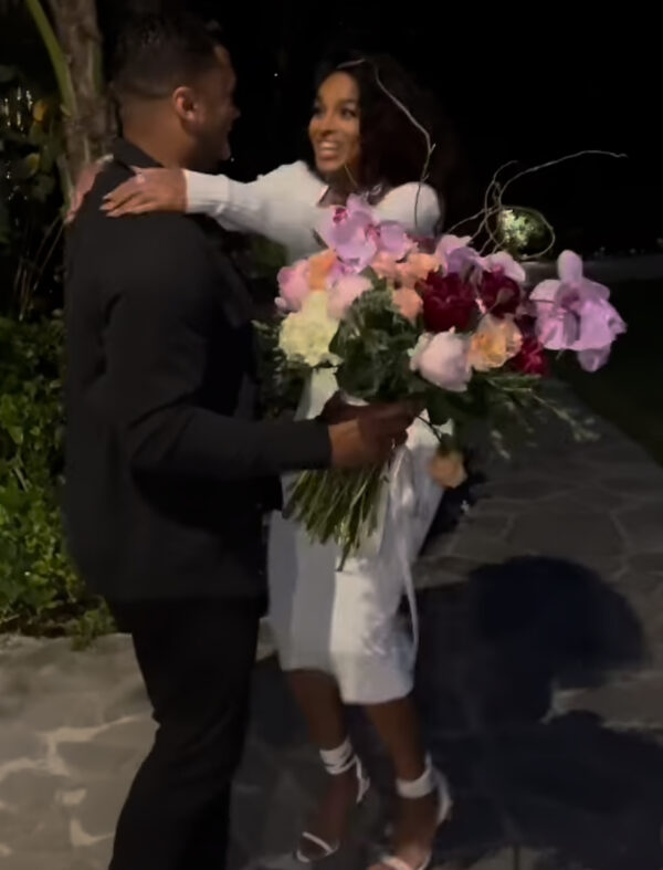 ‘Man Palm That Apple’: Russell Wilson’s Sweet Surprise for Ciara Has Fans Focusing on His Hands 