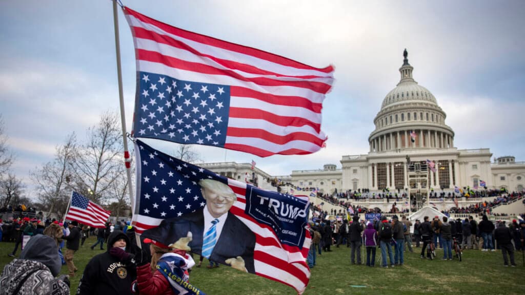 Race stands as a backdrop in Jan. 6 committee hearings on Capitol Hill