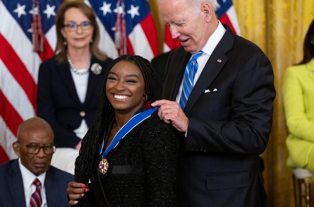 Internationally renowned Simone Biles was offered a coloring book during her flight; attendant thought she was a kid