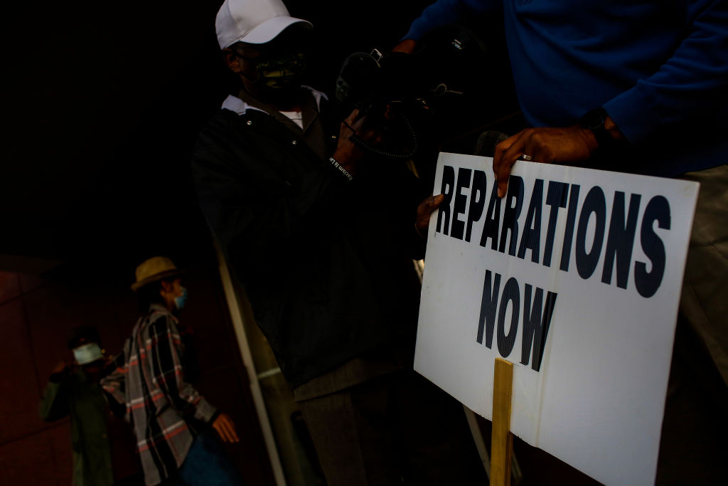Op-Ed: Reparations Must Be More Than A Check