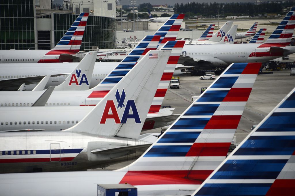 Video Shows Whitesplaining Passenger Sobbing While Cops Kick Him Off Plane Over Pre-Flight Cocktail