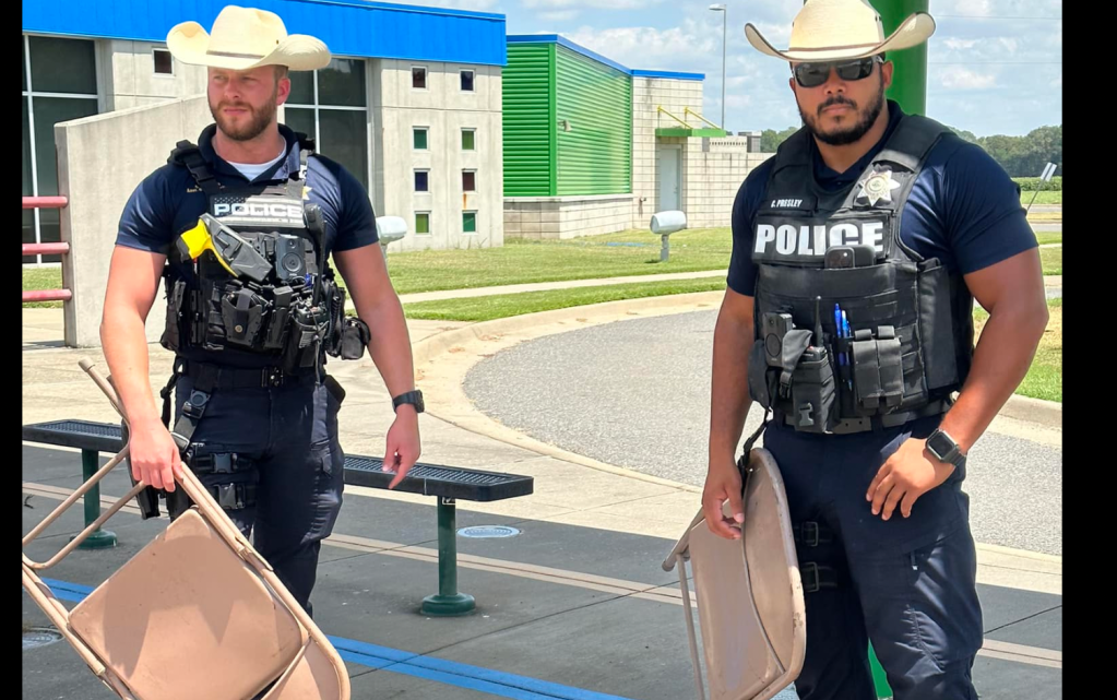 Symbolic Gaslighting: Cops Pose With Folding Chairs, Seemingly Mocking Riverboat Brawl