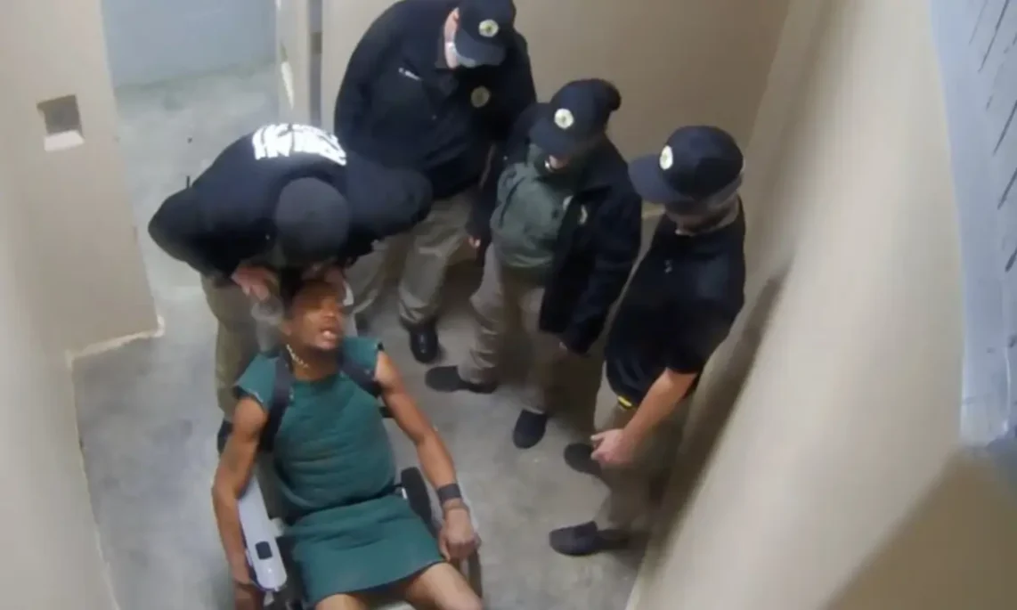 ‘Gonna Put You Back In the Cotton Field’: White Georgia Guard Sued After Video Shows Him Choking Restrained Black Inmate with Leg Chains