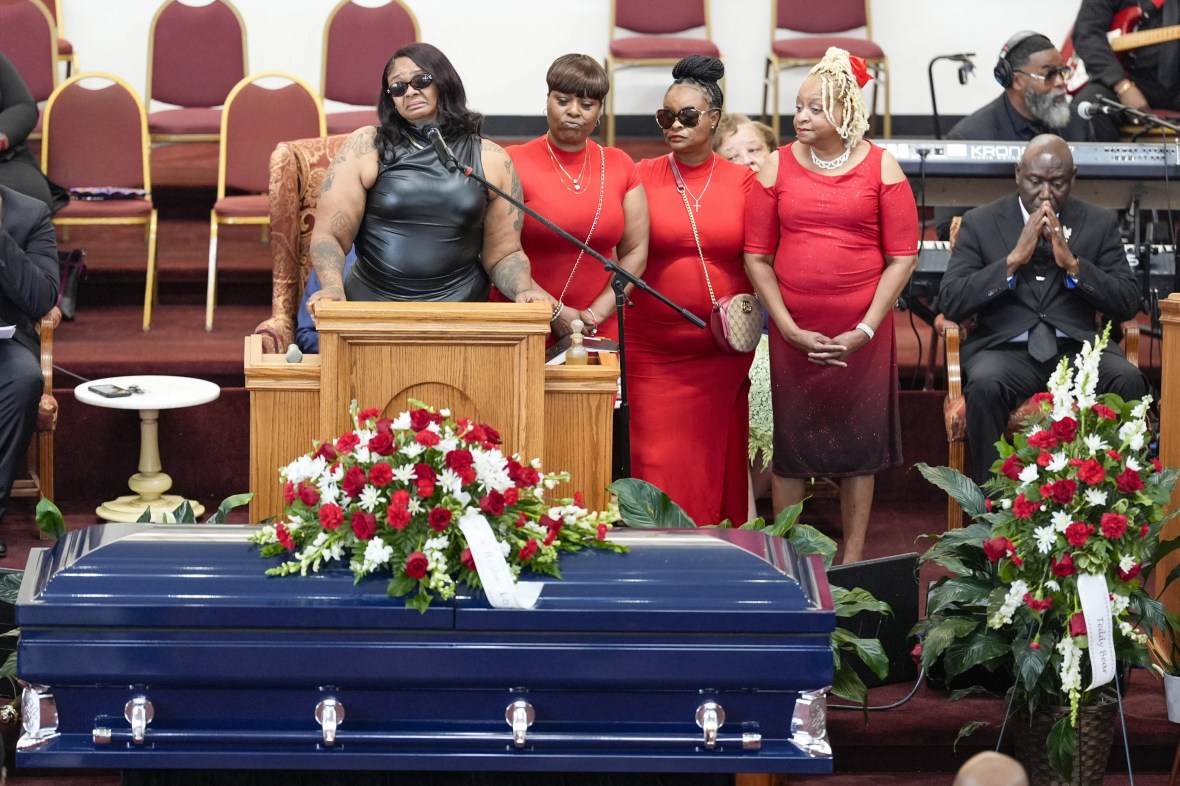 Family vows during funeral to push for charges after Black man pinned to ground outside hotel