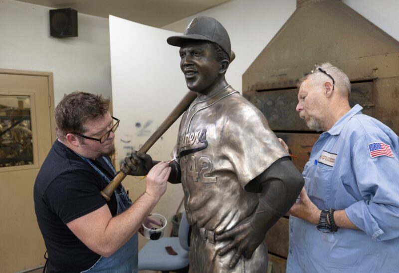 A rebuilt bronze Jackie Robinson statue returns to Kansas 6 months after the original was stolen