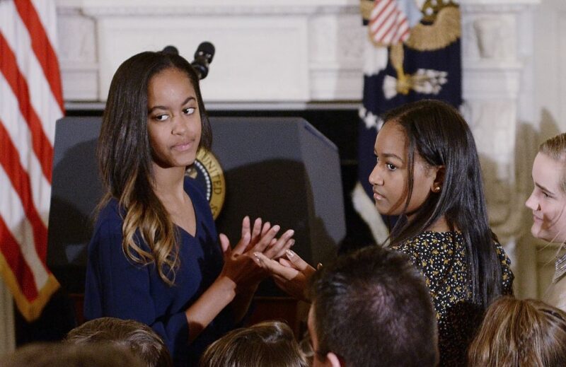 ‘Homegirl Refuses to Wear a Bra’: Sasha and Malia Obama’s ‘Trashy’ Fashion Choices Spark Outrage But Fans Aren’t Having It