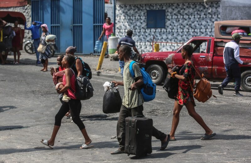 Masses of residents flee homes in Haiti’s capital as gangs ratchet up violence