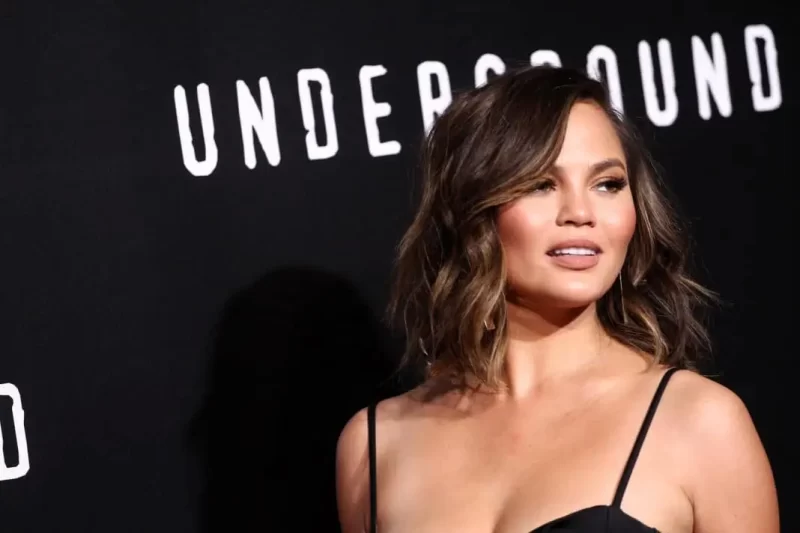 ‘That Doesn’t Seem Sanitary’: Chaos Erupts as Grossed-Out Fans Slam Chrissy Teigen Over ‘Dirty Feet’ on the Kitchen Counter While She Cooks 