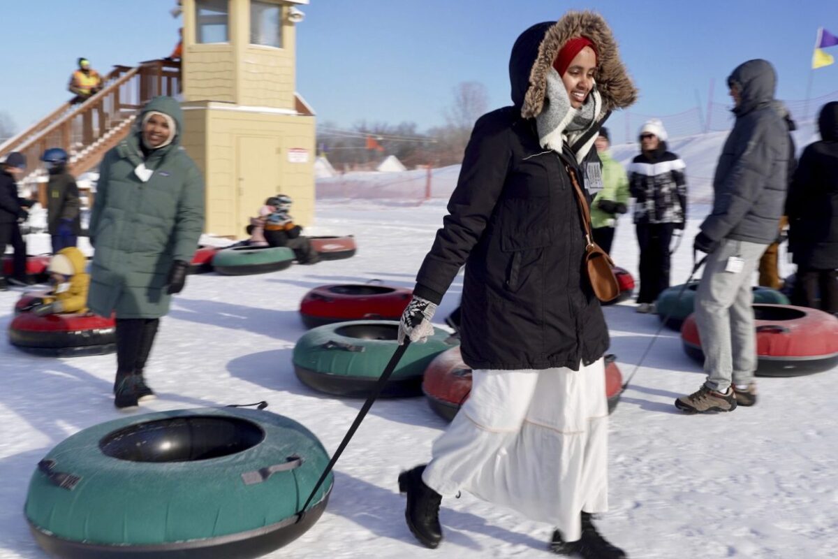 Scarves over headscarves, Muslim women’s outdoors group tackles snow tubing in Minnesota