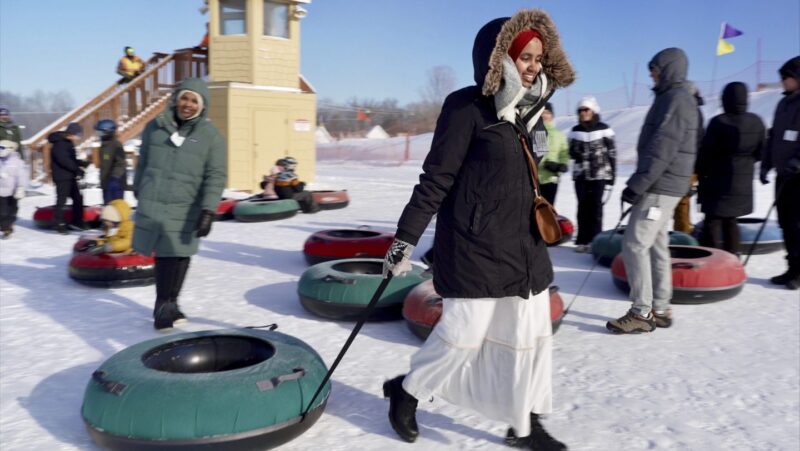 Scarves over headscarves, Muslim women’s outdoors group tackles snow tubing in Minnesota