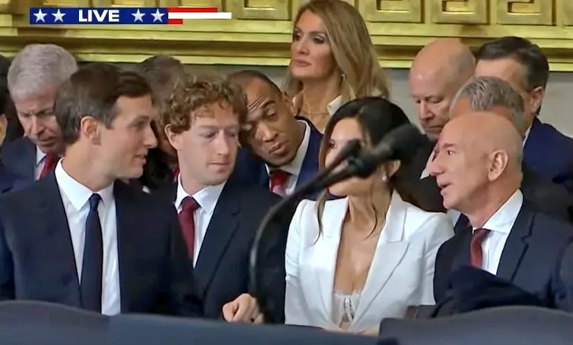 ‘Is That a Bra?’: Mark Zuckerberg Caught ‘Sneaking a Peek’ at Jeff Bezos’ Fianceé as She Slips Into ‘Blow-Up Doll’ Attire for Donald Trump’s Inauguration