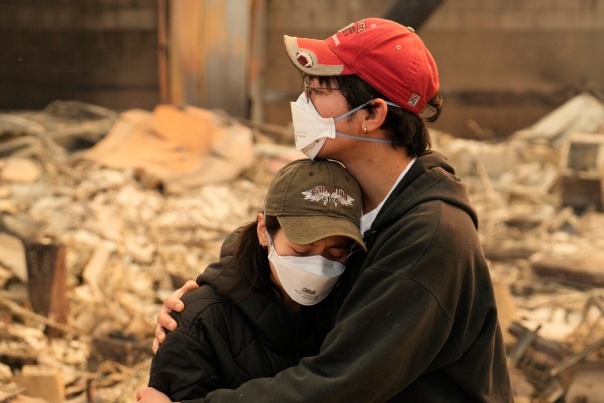 In Los Angeles, people snap up air filters and wear masks against smoke pollution