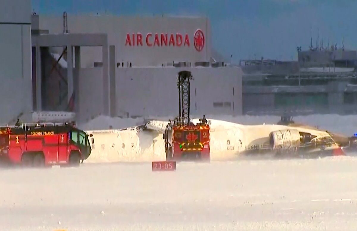 Delta Airlines flight flips over on landing at Toronto’s Pearson Airport and 8 people are hurt