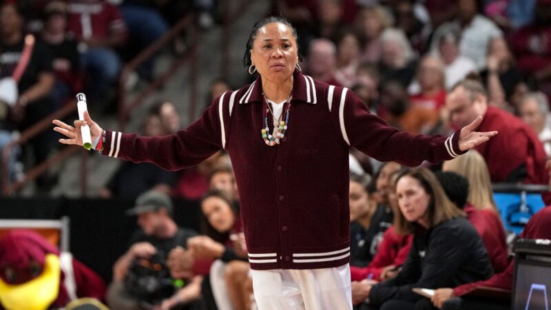 A handful of March Madness coaches stand out for their fashion choices amid a sea of casual attire