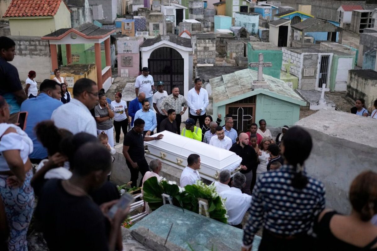 Burials begin as the search ends for victims in the Dominican nightclub collapse that killed 221
