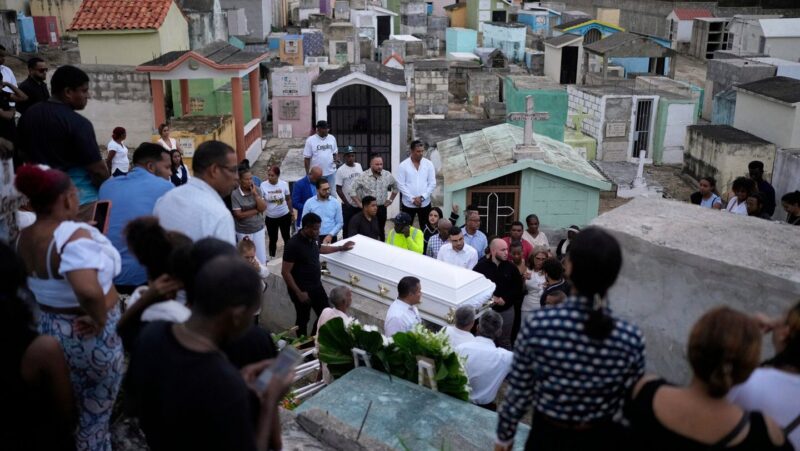 Burials begin as the search ends for victims in the Dominican nightclub collapse that killed 221