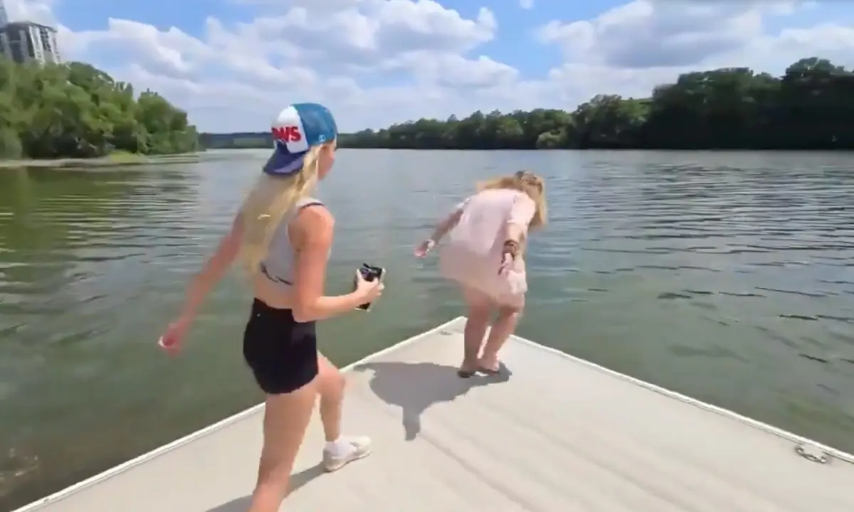 ‘They Won’t Let Me In!’: Influencer Sobs Outside of TikTok Headquarters After She’s Banned Over Video Showing Her Paying Homeless Woman Who Can’t Swim $20 to Jump In Texas Lake