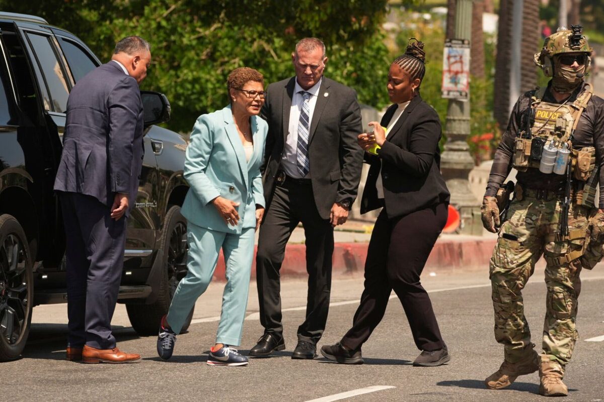 Karen Bass confronts troops in LA’s MacArthur Park in largely immigrant neighborhood