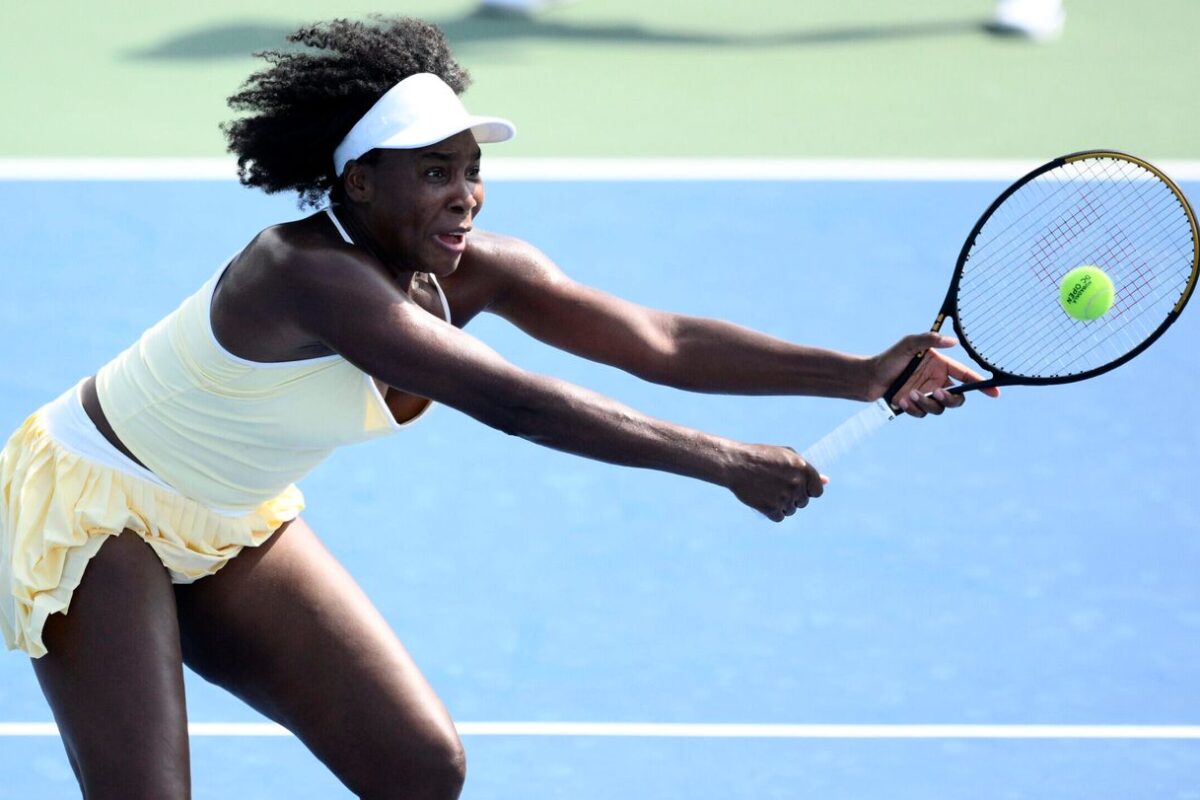 Venus Williams wins a doubles match at Washington in her first tournament in more than a year