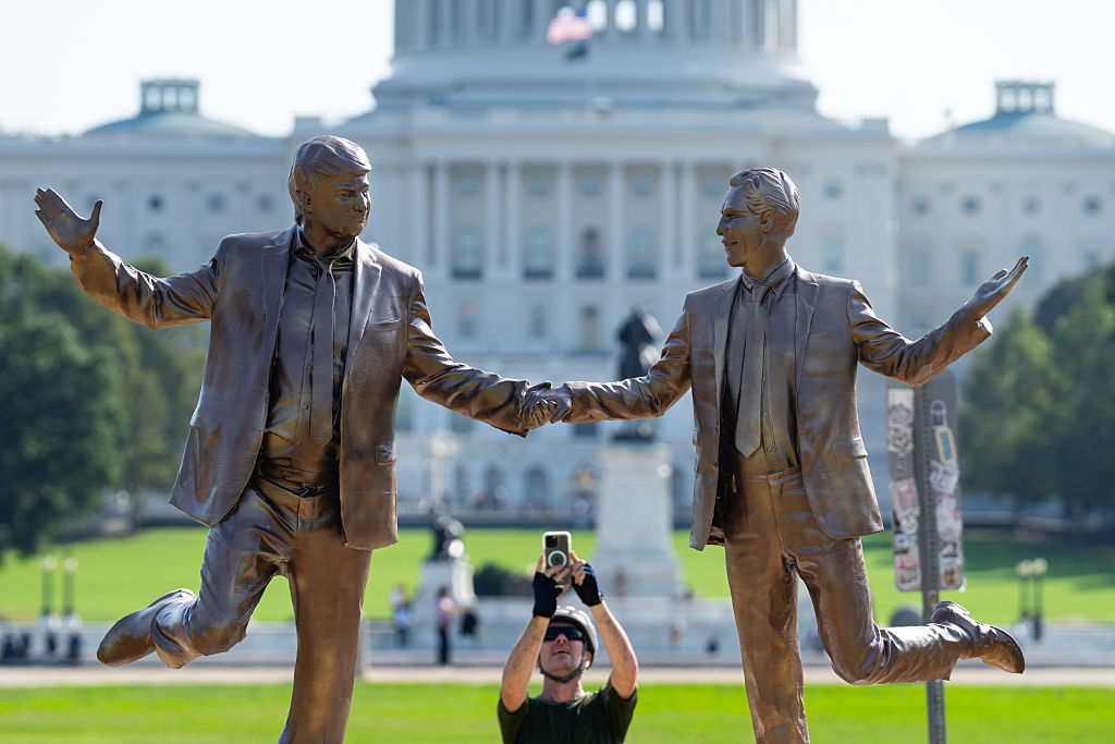 Somebody Erected A Statue Of Trump Holding Hands With Jefferey Epstein, And — This Is My Kind Of Carrying On!