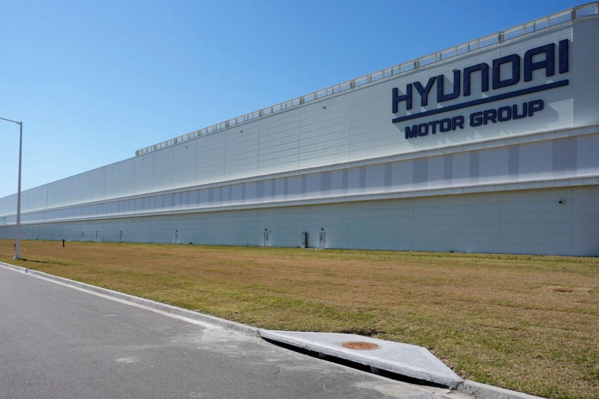 Homeland security official says 475 people were detained during an immigration raid in Georgia