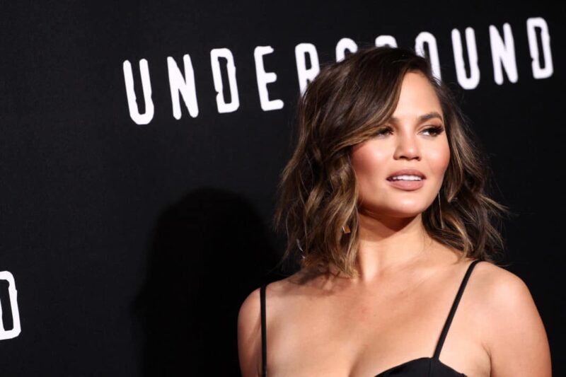 ‘Yeah, Every Mom Dresses Like That and with Two Kids’: Chrissy Teigen’s Revealing Outfit in Family Video Sparks Backlash After Viewers Zoom In