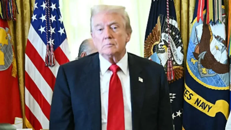 ‘Holy Crap!’: Trump Jumps Up in the Oval Office — and Fans Zoom In on the Man in the Background Grabbing His Nose