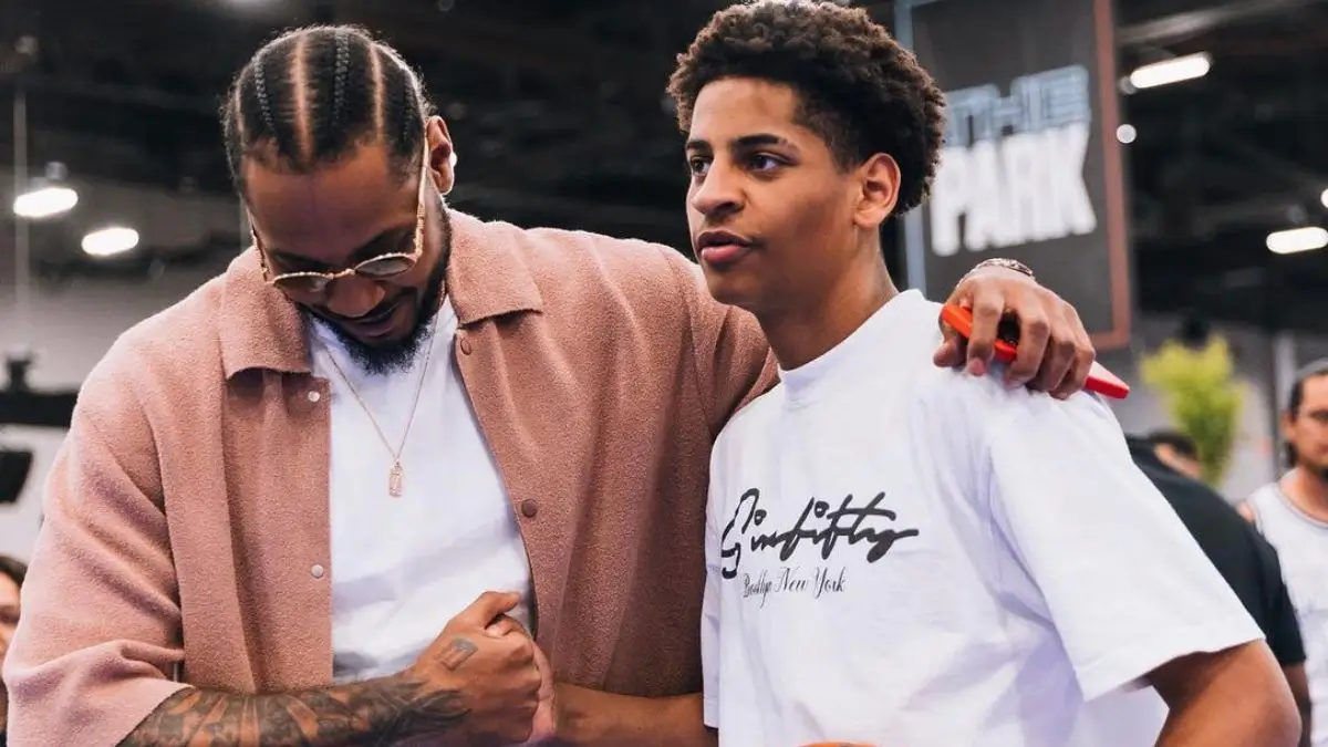 ‘Melo Be Embarrassing That Boy’: Carmelo Anthony’s Antics Have Fans Side-Eyeing and Checking on Kiyan as His Dad Steals the Spotlight Yet Again
