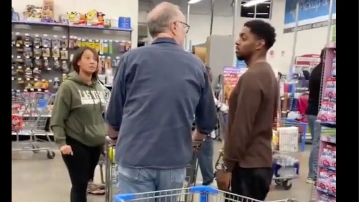 ‘What the Hell?!’ White Shopper Frustrated Over Long Checkout Line Rams Cart Into Black Woman, But Backs Off After Black Man Steps In