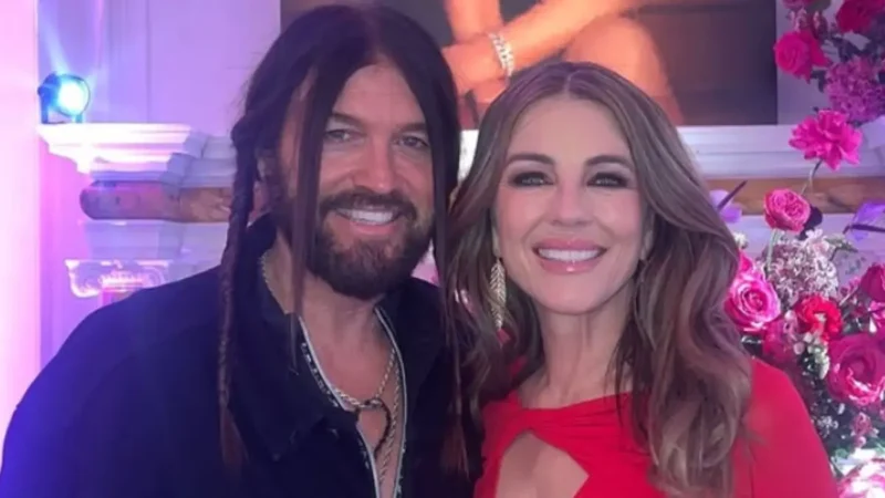 ‘Can’t Sink With Those’: Billy Ray Cyrus’ Girlfriend Elizabeth Hurley Turns Her Family Vacation into a Bikini Moment That Has Fans Zooming In