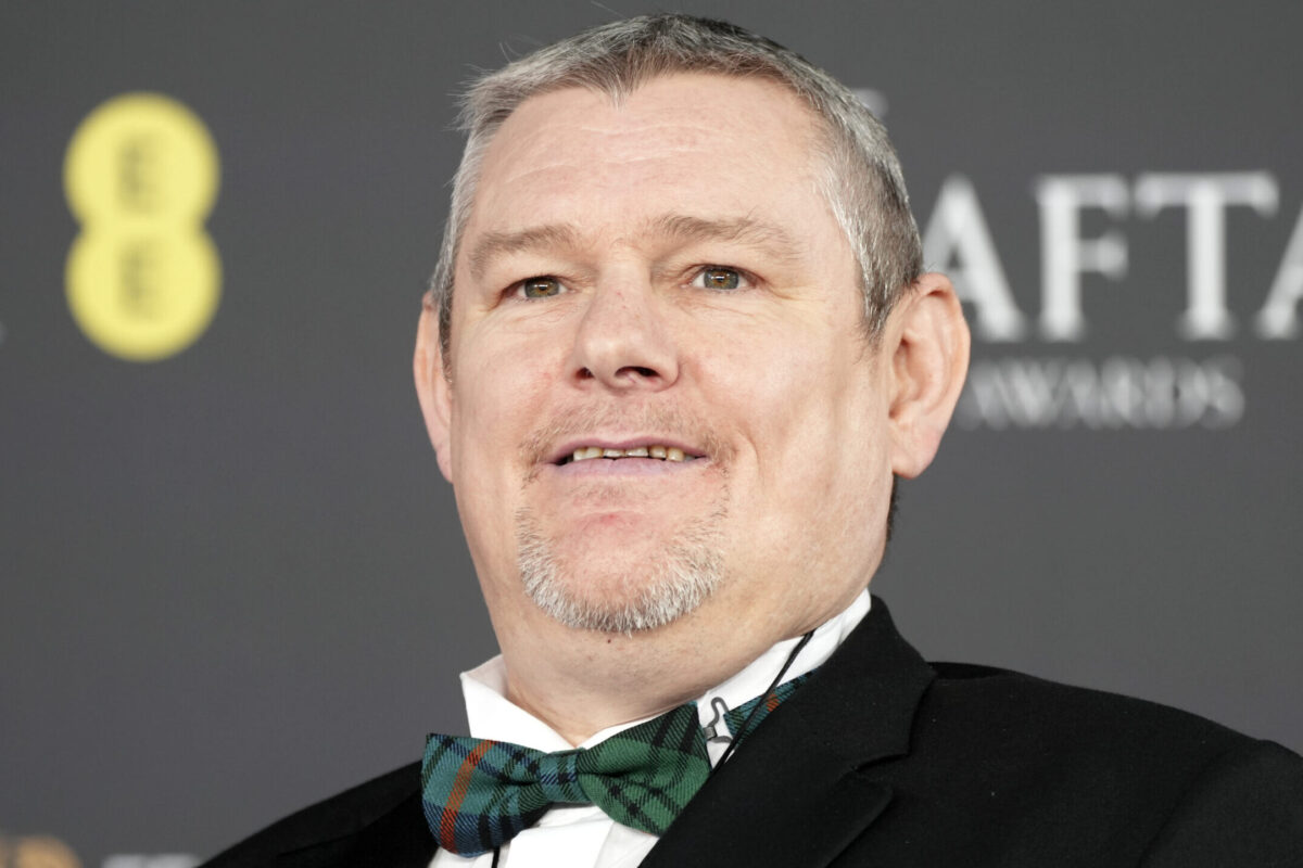 John Davidson, who vocalized the N-word during the BAFTAs, is asking why he was seated by a microphone